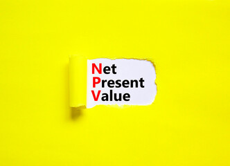 NPV net present value symbol. Concept words NPV net present value on white paper on a beautiful yellow background. Business and NPV net present value concept. Copy space.