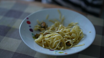 Pasta spaghetti noodles on plate leftovers