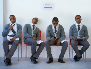 Making him sweat. Conceptual image of a young man being kept waiting for an interview.