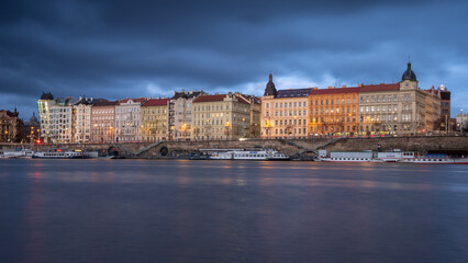 The Vltava embankment in Prague shortly after sunset