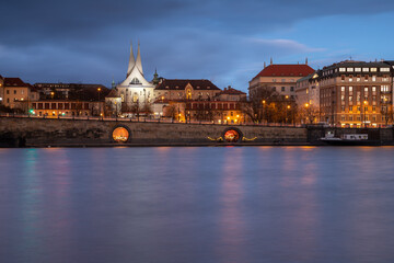 The Vltava embankment in Prague shortly after sunset