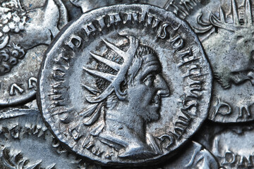 Ancient Roman silver coin with portrait of emperor