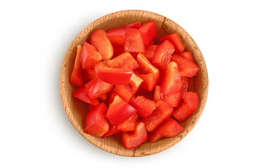 slices of red sweet bell pepper in wooden bowl isolated on white background with full depth of field. Top view. Flat lay