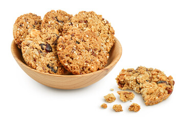 Granola cookie in wooden bowl isolated on white background with full depth of field
