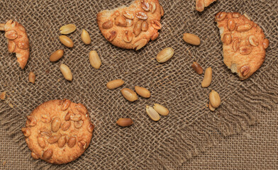 Cookies with nuts. Whole and broken cookies. Vintage style.