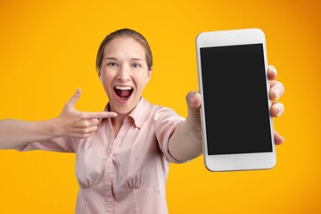 Fototapeta na wymiar Young person holding blank screen phone