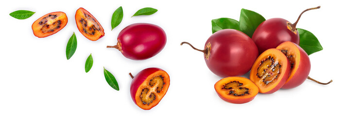 Fresh tamarillo fruit with leaves isolated on white background with copy space for your text. Top view. Flat lay