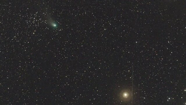 Timelapse of Comet 2022 E3 ZTF moves in the night sky in near of the bright star Aldebaran