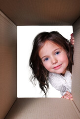 Beautiful little girl with box
