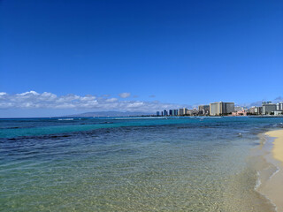 The Perfect Beach Vacation: Waikiki's Protected Waters and Stunning Hotels