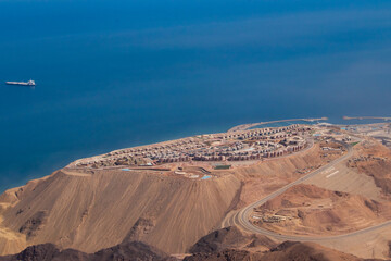 Fototapeta na wymiar view of a new city galala built on very high mountain with back ground of skies and mountains
