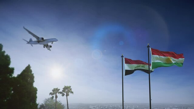 Airplane landing in Kurdistan Region, Iraq. A generic passenger plane lowering its landing gears approaching an airport near Erbil. Iraqi flag waving along with Kurdistani flag.
