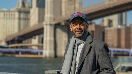 Afro American Man at Brooklyn Bridge New York - street photoraphy - obrazy, fototapety, plakaty