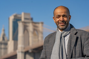 Afro American Man at Brooklyn Bridge New York - street photoraphy - obrazy, fototapety, plakaty