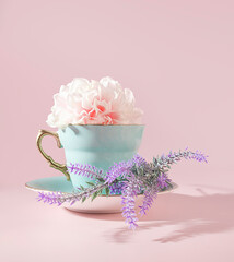 The Perfect Springtime Sip: A Pretty Cup of Floral Tea with Lavender Springs on a Pastel Green Saucer, Tea Party Concept, High Tea