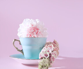 The Perfect Springtime Sip: A Pretty Cup of Floral Tea with Blooming Pink Botanical Florals on a Pastel Green Saucer, Tea Party Concept, Garden Party, High Tea