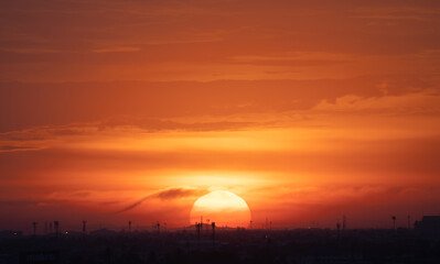 Sunset sky. Abstract nature background. Dramatic blue with orange colorful clouds in twilight time.