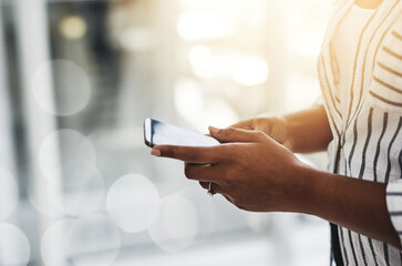 Keep in touch with people who can take you places. Cropped shot of a woman using her cellphone.