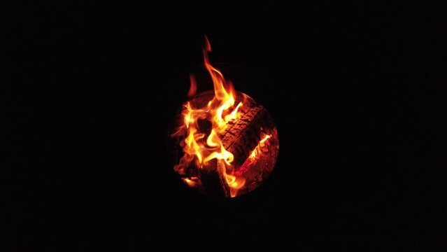 overhead shot of a burning fire in the night