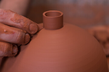 Fototapeta na wymiar Potter making handicrafts