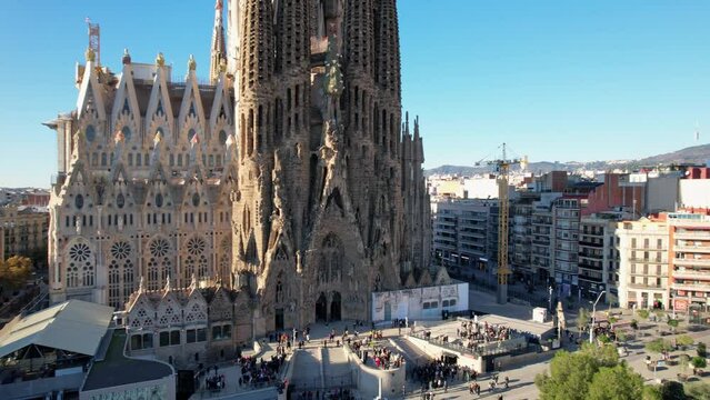 Barcelona, Spain - 12.08.2021: Aerial panoramic view of Barcelona Eixample residencial district, Sagrada familia Catholic Cathedral, UNESCO World Heritage site by an artist Antoni Gaudi.