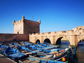 Traditional Moroccan fishing boats in the harbor of Essaouira, Morocco