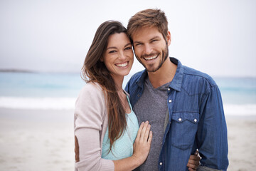 Me and my babe at the beach. Cropped shot of a young couple at the beach.