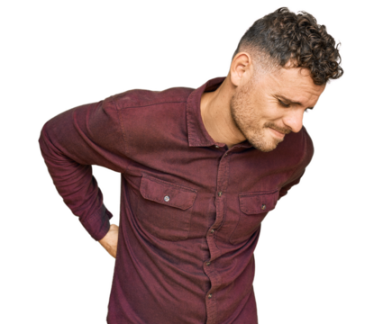Young hispanic man wearing casual clothes suffering of backache, touching back with hand, muscular pain