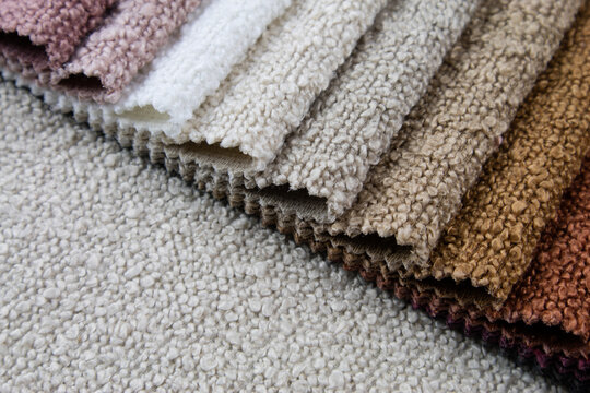 Bright collection of gunny textile samples. Multicolor Fabric texture background. Textiles for modern design. Samples of boucl&eacute; fabric.