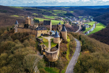 Medieval Bourscheid castle in Luxembourg, aerial view © Boris Stroujko