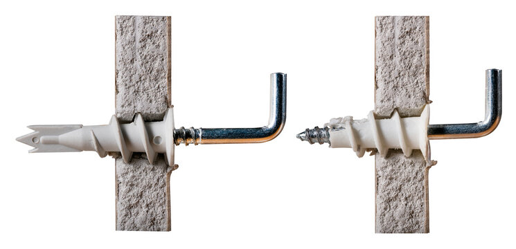 Plastic dowel for fixing hooks in plasterboard. Isolated background.