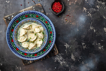 Delicious uzbek dumplings. Manti with lamb meat. Uzbek cuisine, banner, menu, recipe top view