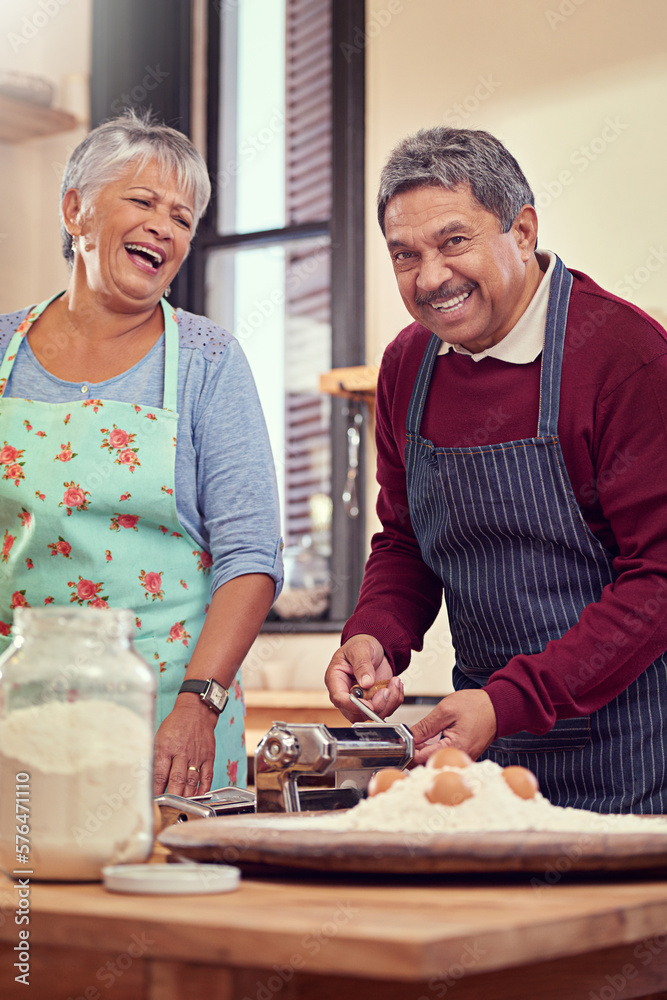 Wall mural This is gonna be good. Shot of a mature couple cooking together at home.