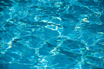 Fototapeta na wymiar Pool water background, blue wave abstract or rippled water texture background.