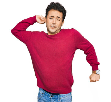 Young handsome man wearing casual clothes stretching back, tired and relaxed, sleepy and yawning for early morning