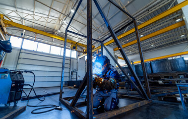 Metal construction technology. Factory warehouse of metalworking close up view.