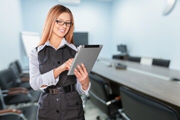 Young smart business woman worker with digital tablet