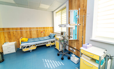 Interior of an empty hospital recovery room. Recovery room with comfortable medical beds.