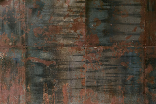 Dark worn rusty metal texture background.