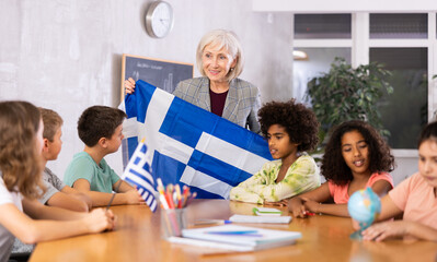 Kids learning together about greece in geography class