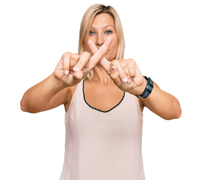 Middle age caucasian woman wearing casual clothes rejection expression crossing fingers doing negative sign - Powered by Adobe