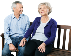 Portrait of a Mature Couple Holding Hands on the Bench