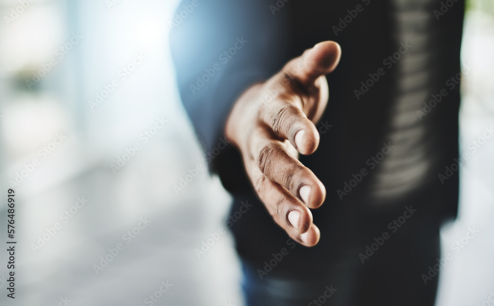 Poster lets become business partners. closeup shot of an unrecognizable businessman extending a handshake i