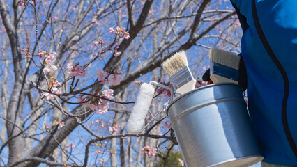 桜と塗装道具｜リフォーム・塗装業者・DIY イメージ