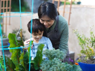 Mother and son gardening 