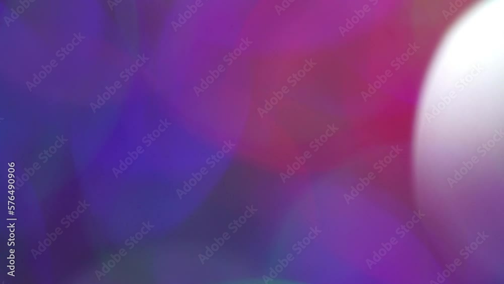Wall mural abstract bokeh lights, lens flares, defocused glowing colorful neon rays. amazing animated backgroun