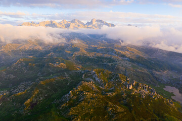 Picturesque landscape of highland Lakes of Covadonga within Picos de Europa National Park at sunset
