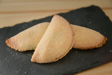 Closeup of some sweet potato cakes, traditional sweet during christmas in Valencia (Spain)