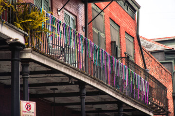 Building balcony with beads in New Orleans Mardi Gras