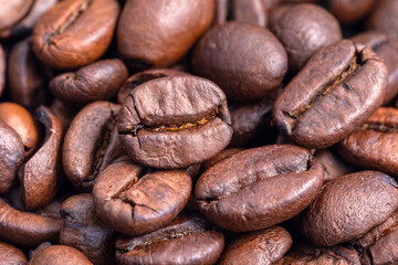 Top view close up of fresh organic roasted coffee beans